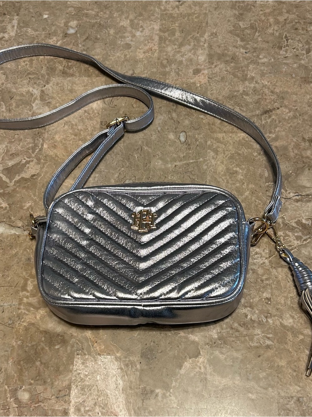 Quilted Metallic Silver Crossbody Bag with Tassel Charm